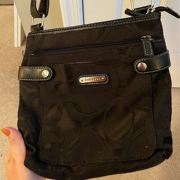 Rosetti black bag with pattern and silver accents. Gently used. Pink inside. - Picture 1 of 2